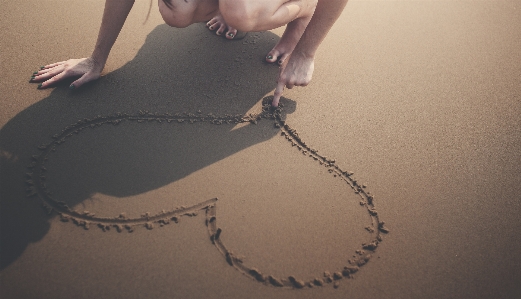 Hand beach sea coast Photo