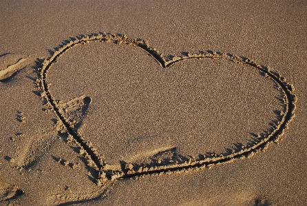 Beach sand love heart Photo