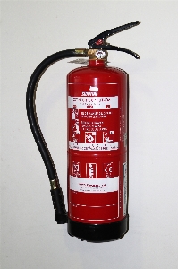 Wall red fire bottle Photo