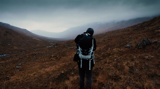 Person mountain cloudy hill Photo