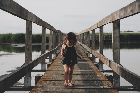 Walking boardwalk girl bridge Photo