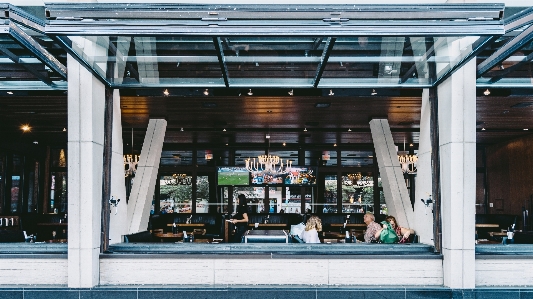 Person window building restaurant Photo