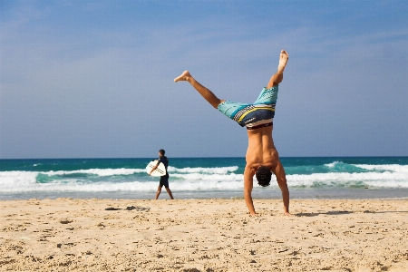 Man beach sea water Photo