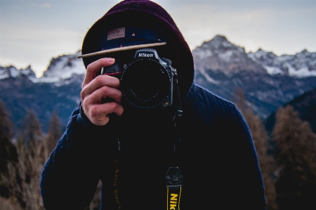 Foto Uomo montagna fotografo avventura