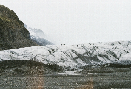 Mountain cloudy cliff glacier Photo