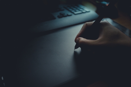 Hand light finger darkness Photo