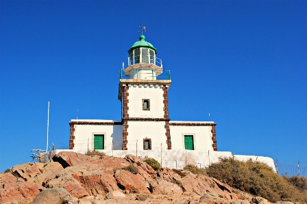 Sea coast person lighthouse Photo