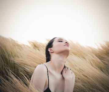 Grass sky girl woman Photo