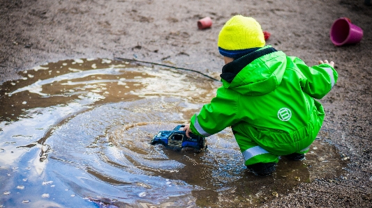 Water sand car play Photo