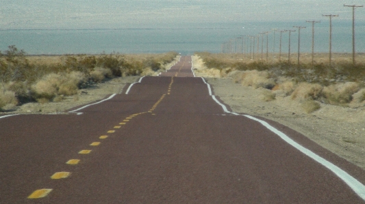 Foto Paisagem caminho areia horizonte