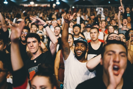 People crowd audience cheering Photo