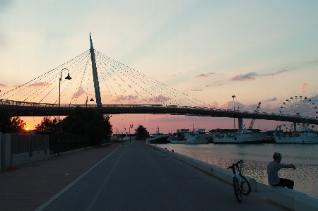 Sea bridge sunrise ferris wheel Photo