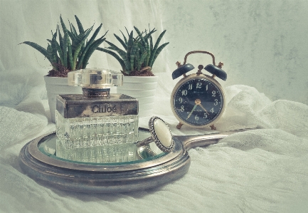 Beauty perfume clock mirror Photo