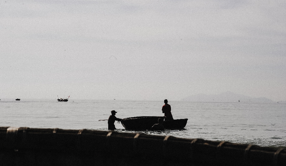 Action beach boats canoe