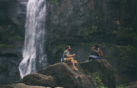 Waterfalls love couple woman Photo