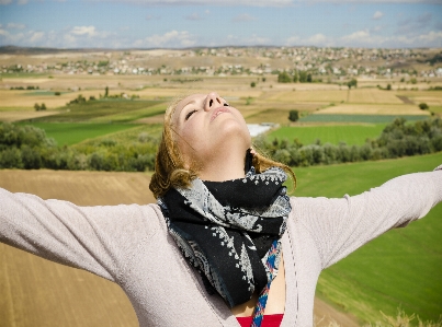 Woman girl mountains arms Photo