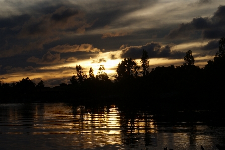 Beautiful sunset river water Photo