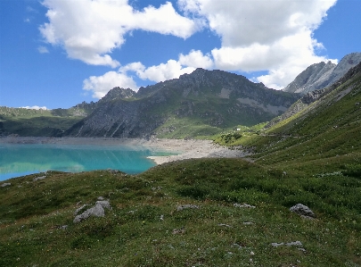 Mountains lake grass artificial Photo