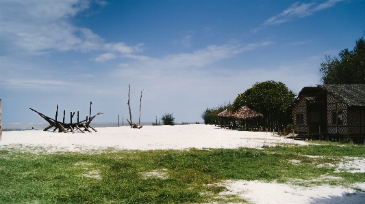 Beach sea house sky Photo