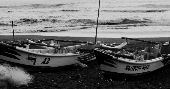 Fisherman sea black and white Photo