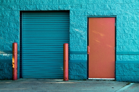 Red door orange shutter wall Photo