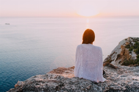 Girl sunset sea ibiza Photo