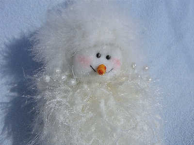 Foto Decoración navideña
 muñeco de nieve peluche
 invierno