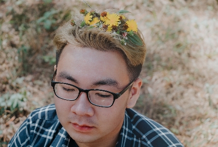 Flower portrait boy glasses Photo