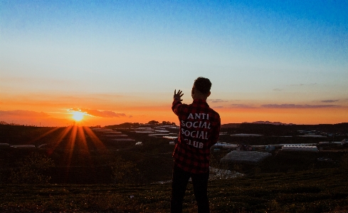 Landscape portrait boy sun Photo