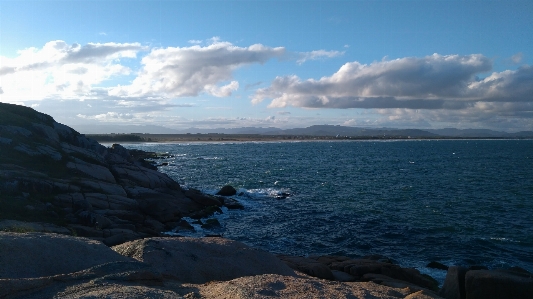 Sea coast sky coastal and oceanic landforms Photo