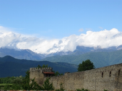 Mountains snow green white Photo