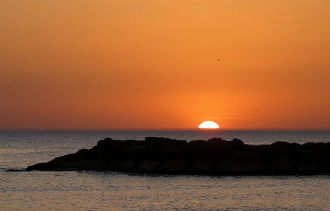 Sunset sea rocks mediterranean Photo