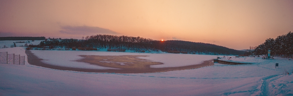 Winter lake blue and orange snow