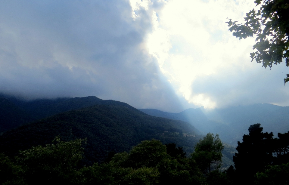 Sky before rain sun rays mountains