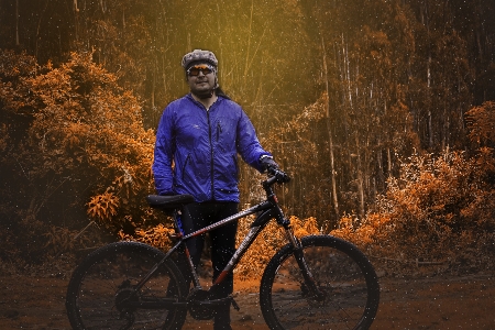 Forest helmet bicycle man Photo