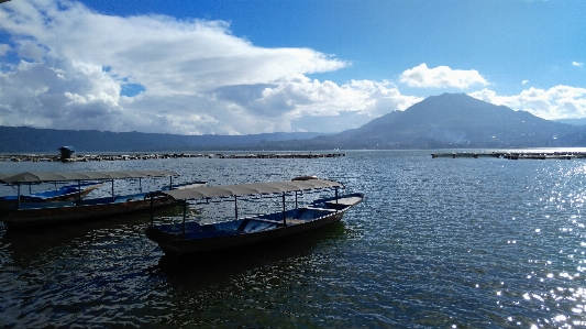 Lake volcano boat sunny Photo