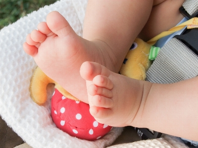 Adorable baby barefoot child Photo