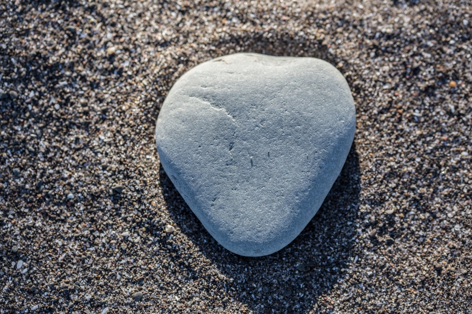 Rock heart shape beach pebble