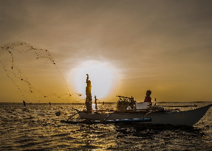 Fisherman sunset sky water Photo