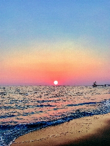 Beach golden sunset purple sand Photo