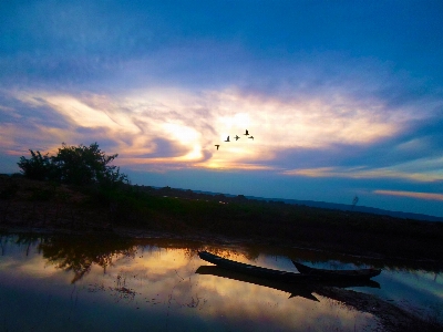 Foto Barche cielo orizzonte riflessione