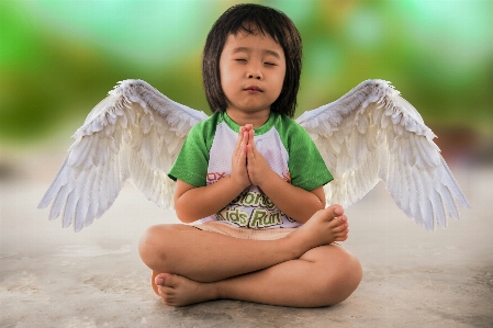 Little girl freedom angel yoga Photo