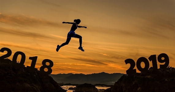 Jumping woman mountain cover Photo