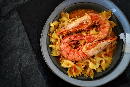 Pasta shrimps prawns tomato Photo