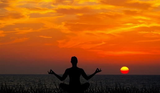 Meditating sunset meditation yoga Photo