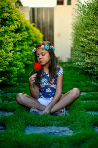 Girl green plant blue Photo