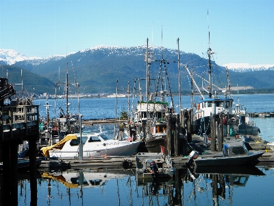 Boats mountains marina harbor Photo