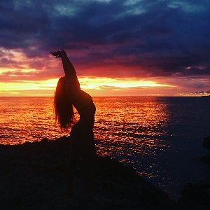 Girl sky sunset sea Photo