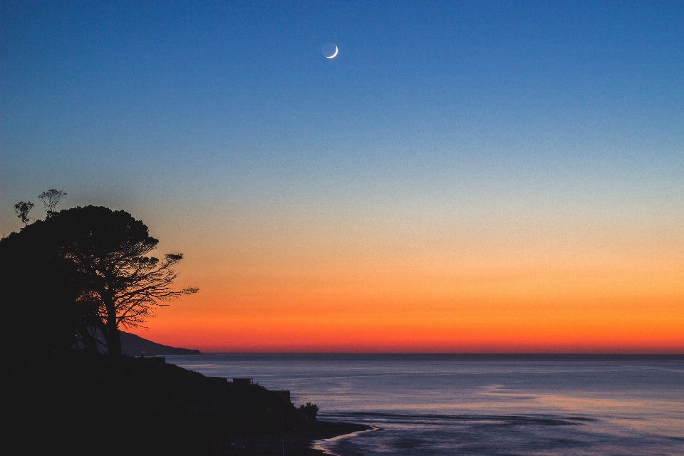 Mare tramonto spiaggia colori