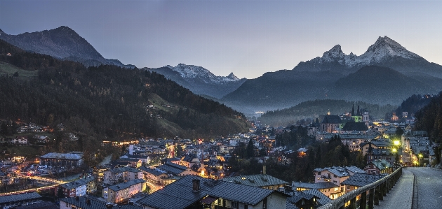 Mountain range mountainous landforms village sky Photo